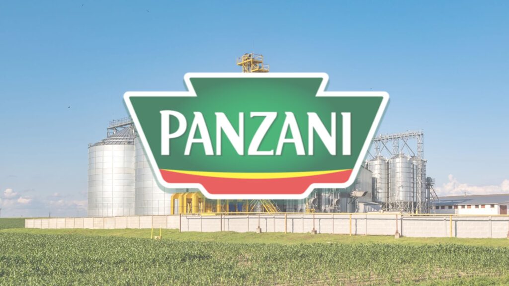 Logo Panzani sur fond d'usine agroalimentaire
